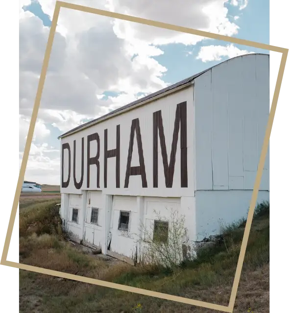 Historic Durham Meat & Seafood building symbolizing family-owned meat and seafood brands united by quality standards