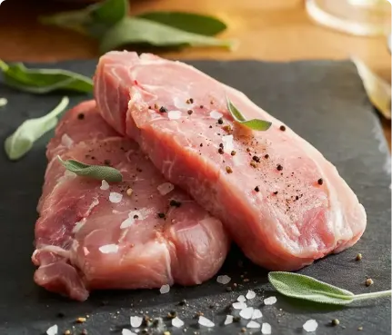 Premium pork cuts processed for menu consistency